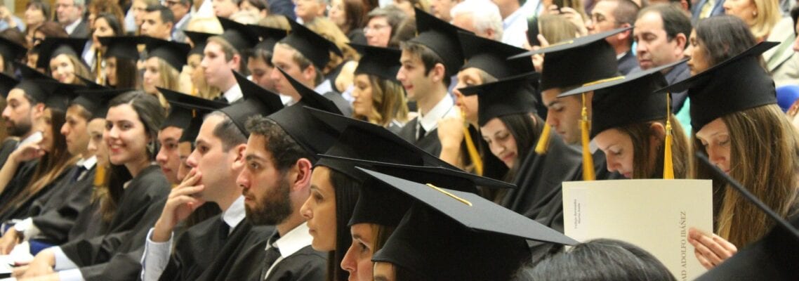 A group of people in graduation gowns and hats.