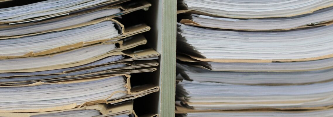 A close up of papers stacked on top of each other