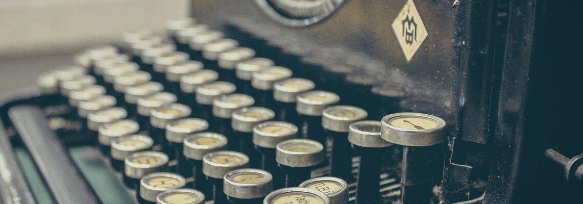 A close up of an old fashioned typewriter