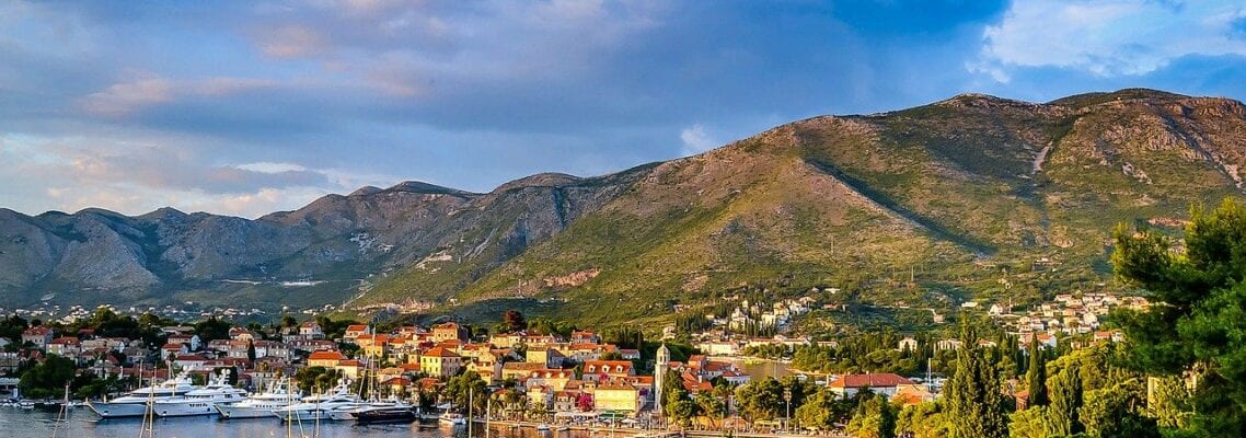 A view of the bay and mountains from above.