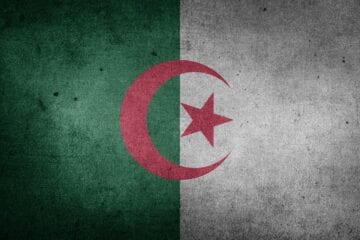 A flag of algeria painted on the wall.