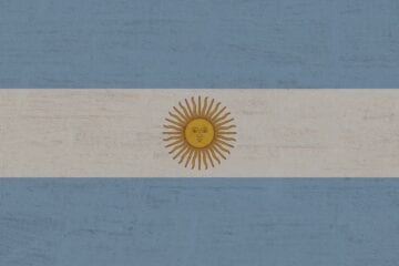 A flag of argentina painted on the wall.