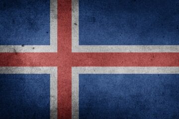 A flag of iceland painted on the wall.