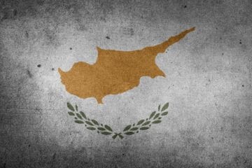 A flag of cyprus painted on the wall.