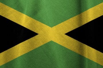 A close up of the flag of jamaica