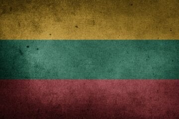 A flag of lithuania with a textured background.