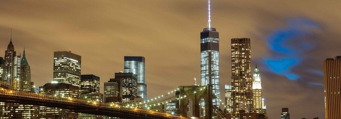 A view of the city skyline at night.